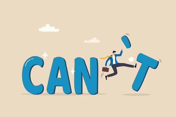 The cartoon character kicks over the "t" in the word "can't," implying that visa agents can change the situation.