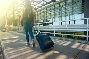 A young woman is about to embark on an international travel; this is her first solo trip of China travel.