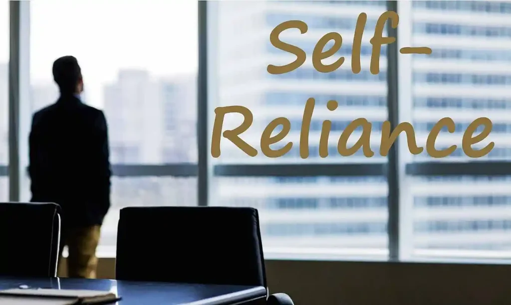A man looking out a window with "self-reliance" written on it, symbolizing international travel independence.