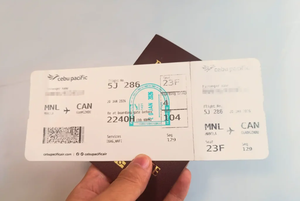 A person holding a boarding pass for international travel can show it to immigration officials.