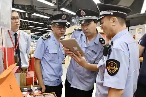 chinese police officer whose checking some information of a person