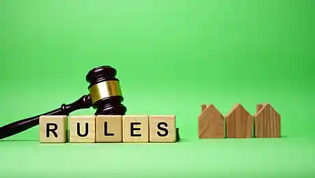 A hammer and wood have "rules" words on it, which means the visa type in a Chinese visa application depends on the purpose.